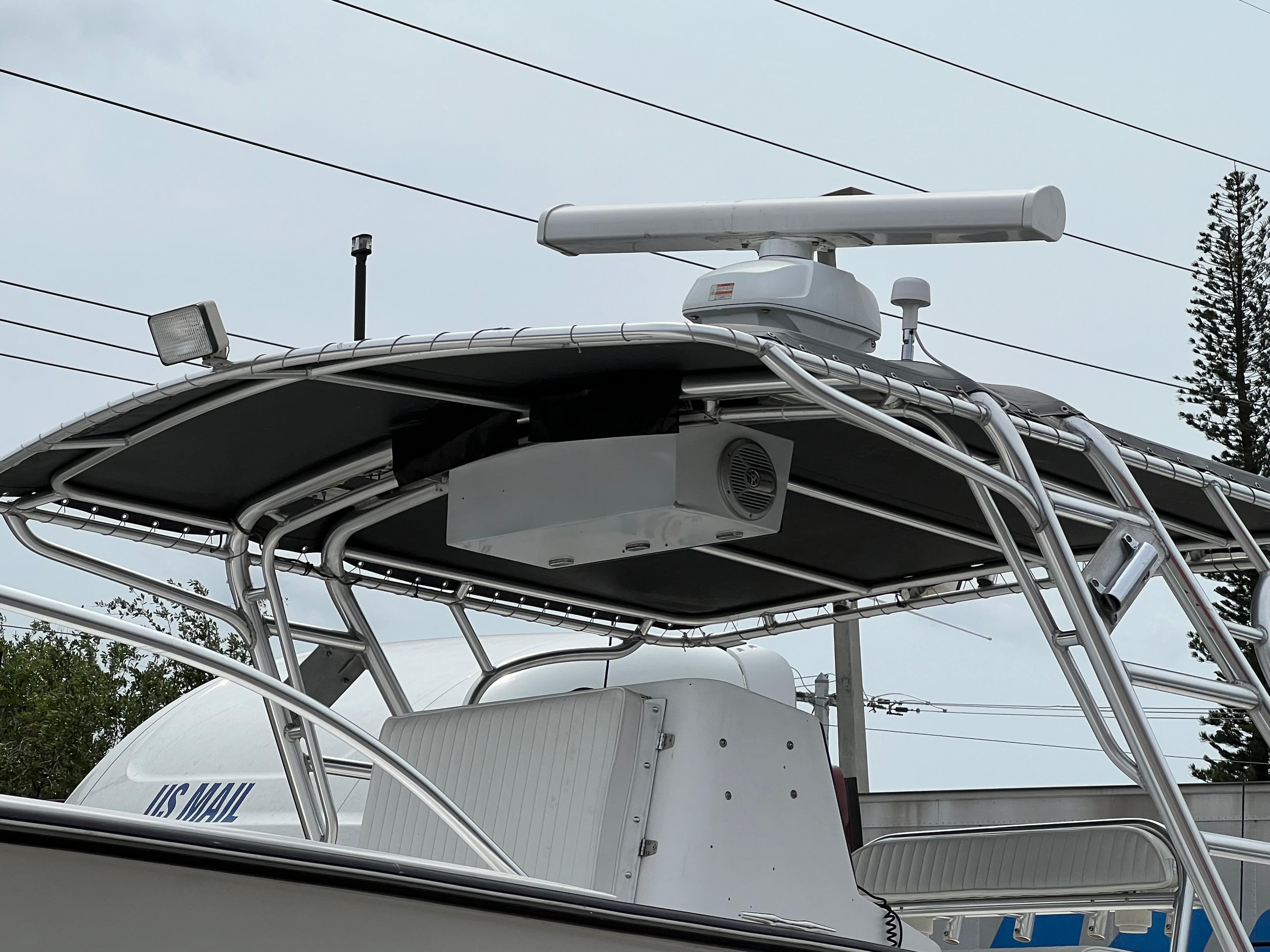Stuart Angler 32 Center Console boat, radar equipment, and T-top, 2000 model.