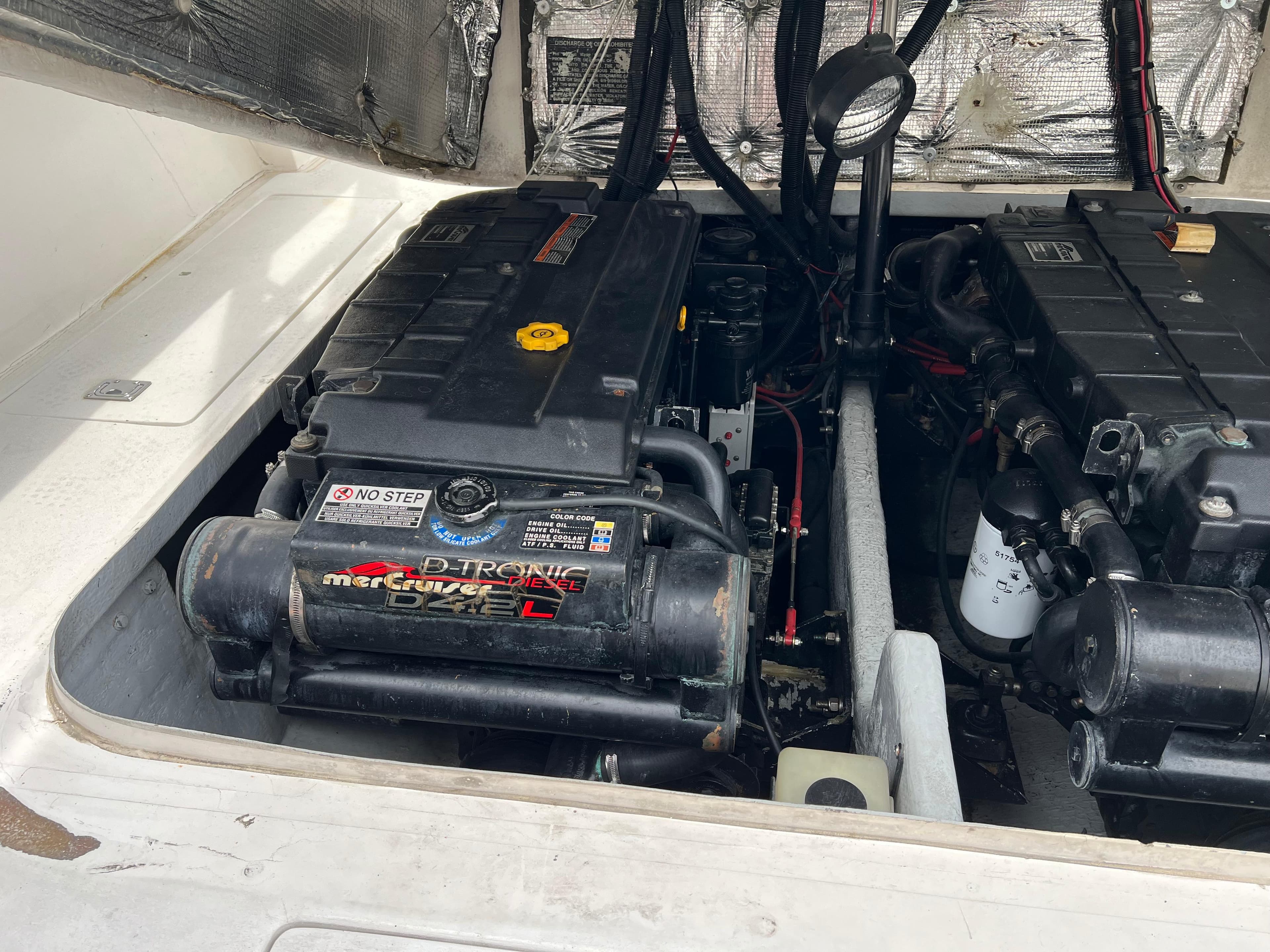 Engine compartment of a 2000 Stuart Angler 32 Center Console/Cutty boat.