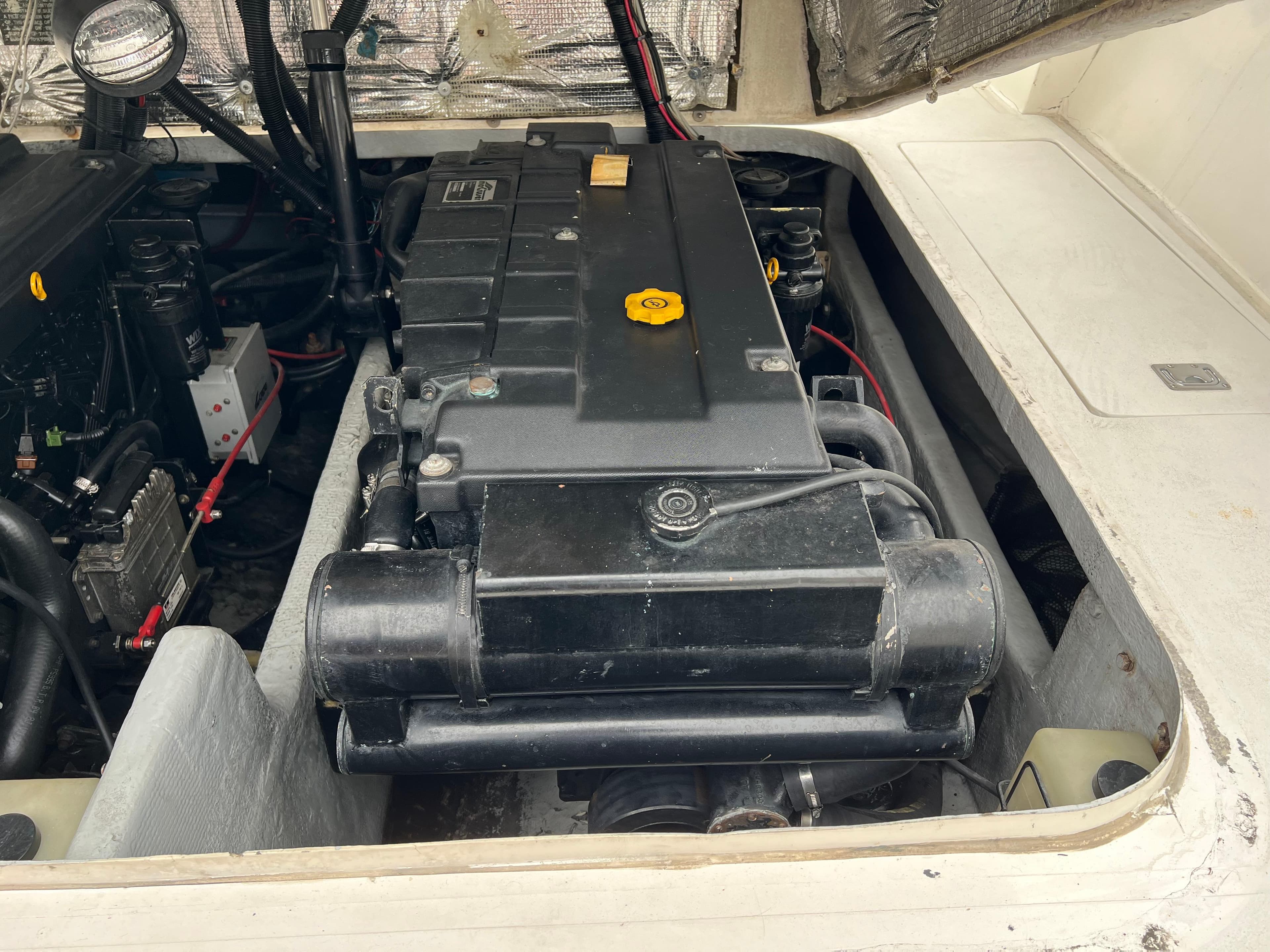 Engine compartment of a 2000 Stuart Angler 32 Center Console/Cutty boat.