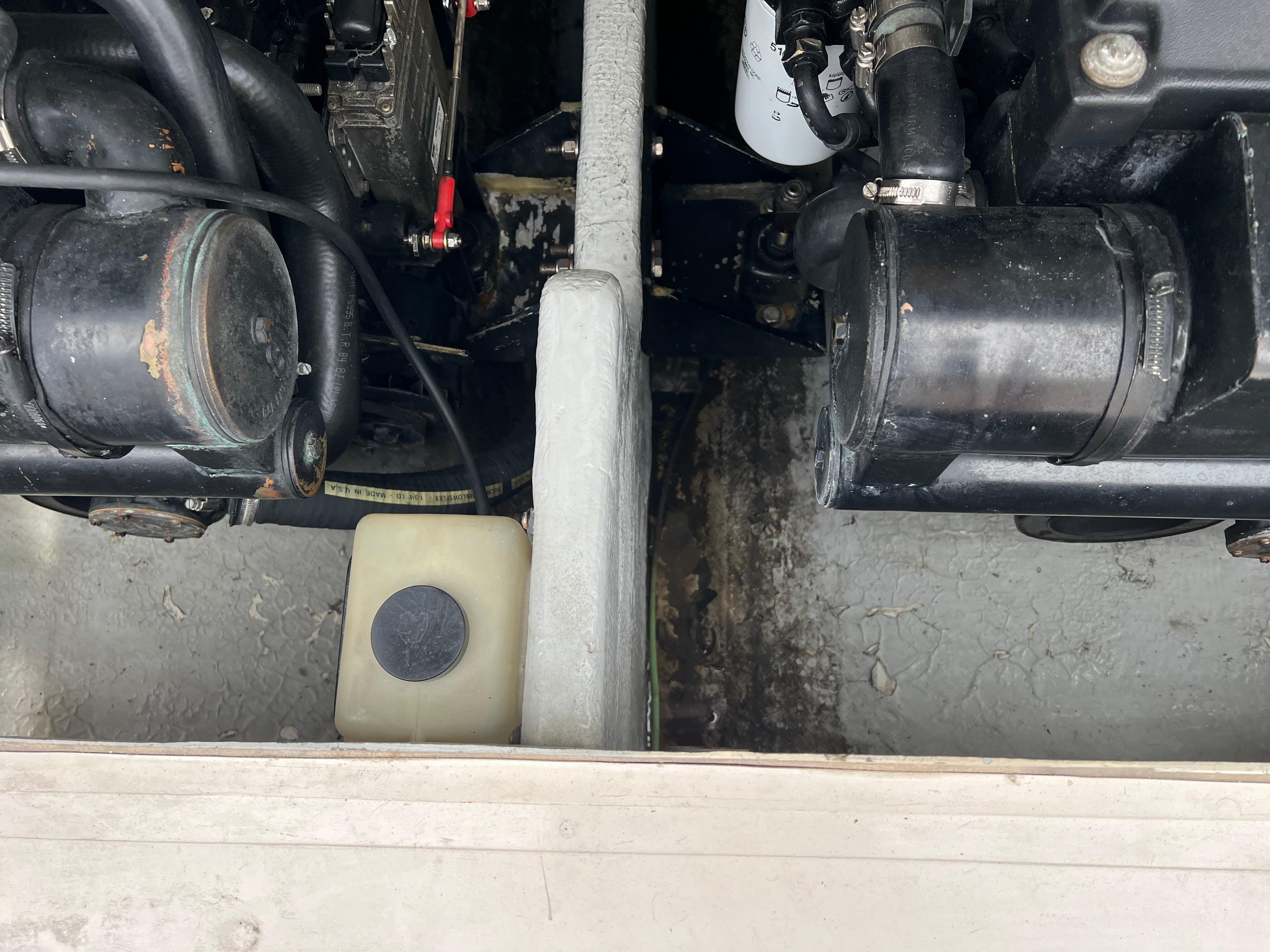 Engine compartment of a 2000 Stuart Angler 32 Center Console/Cutty boat.
