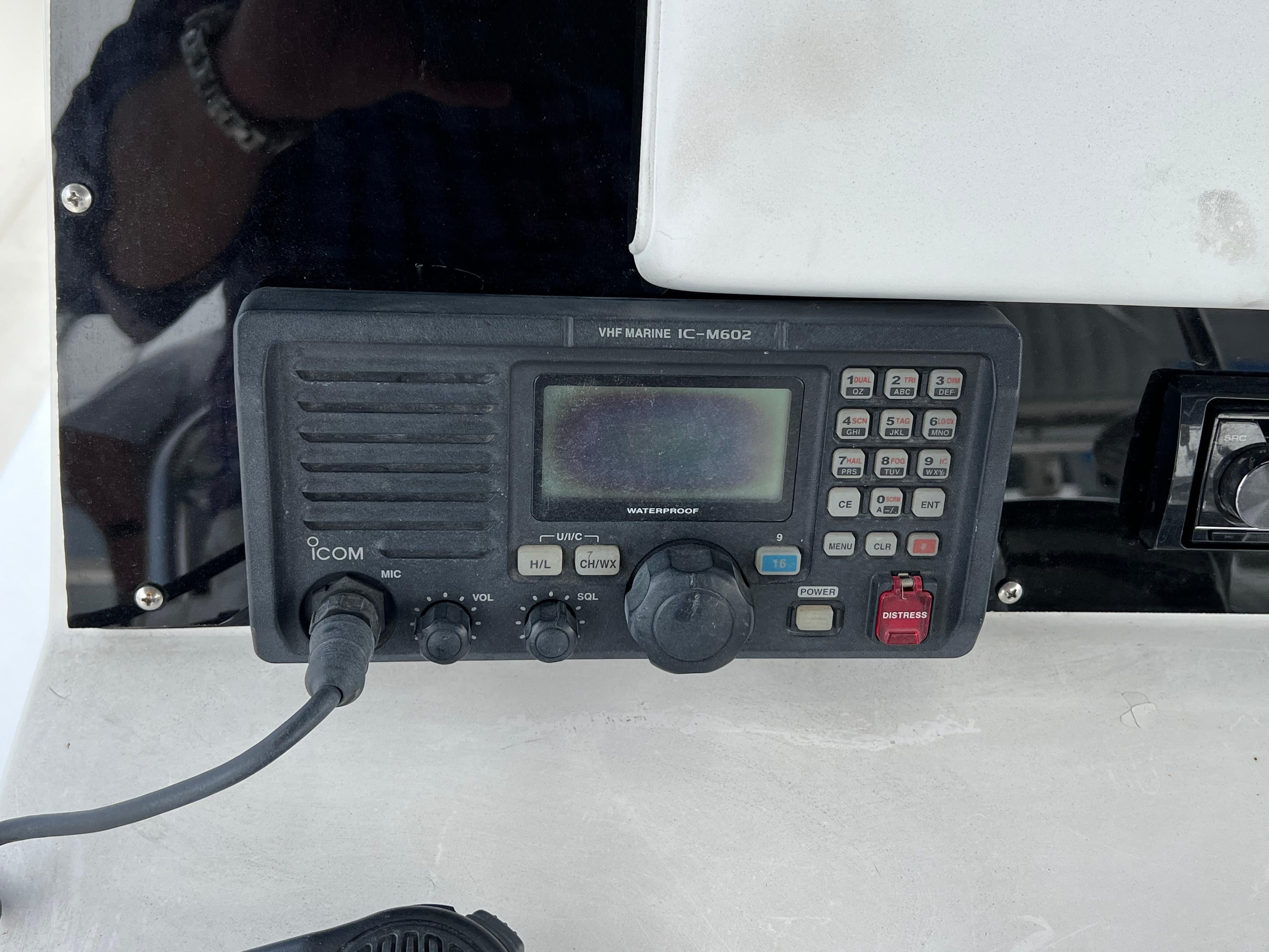 VHF marine radio IC-M602 on a 2000 Stuart Angler 32 Center Console boat.
