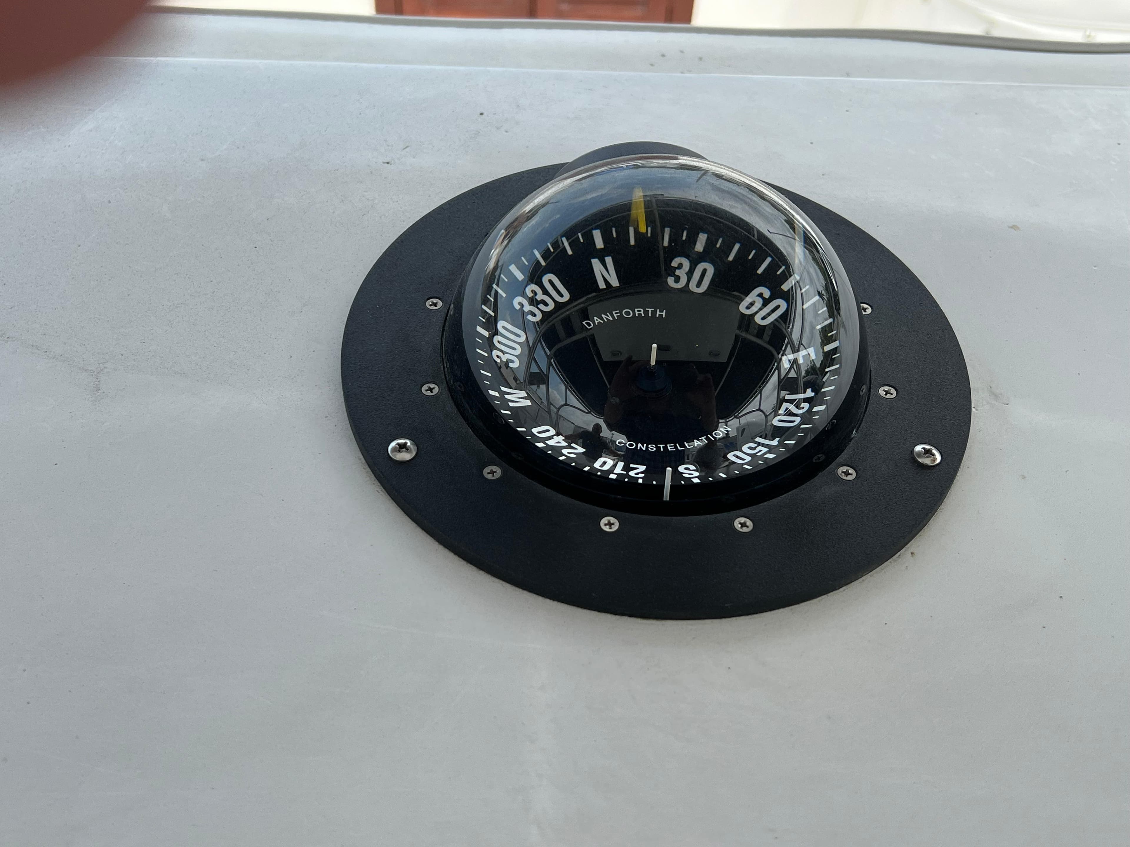 Compass on 2000 Stuart Angler 32 Center Console/Cutty boat dashboard.