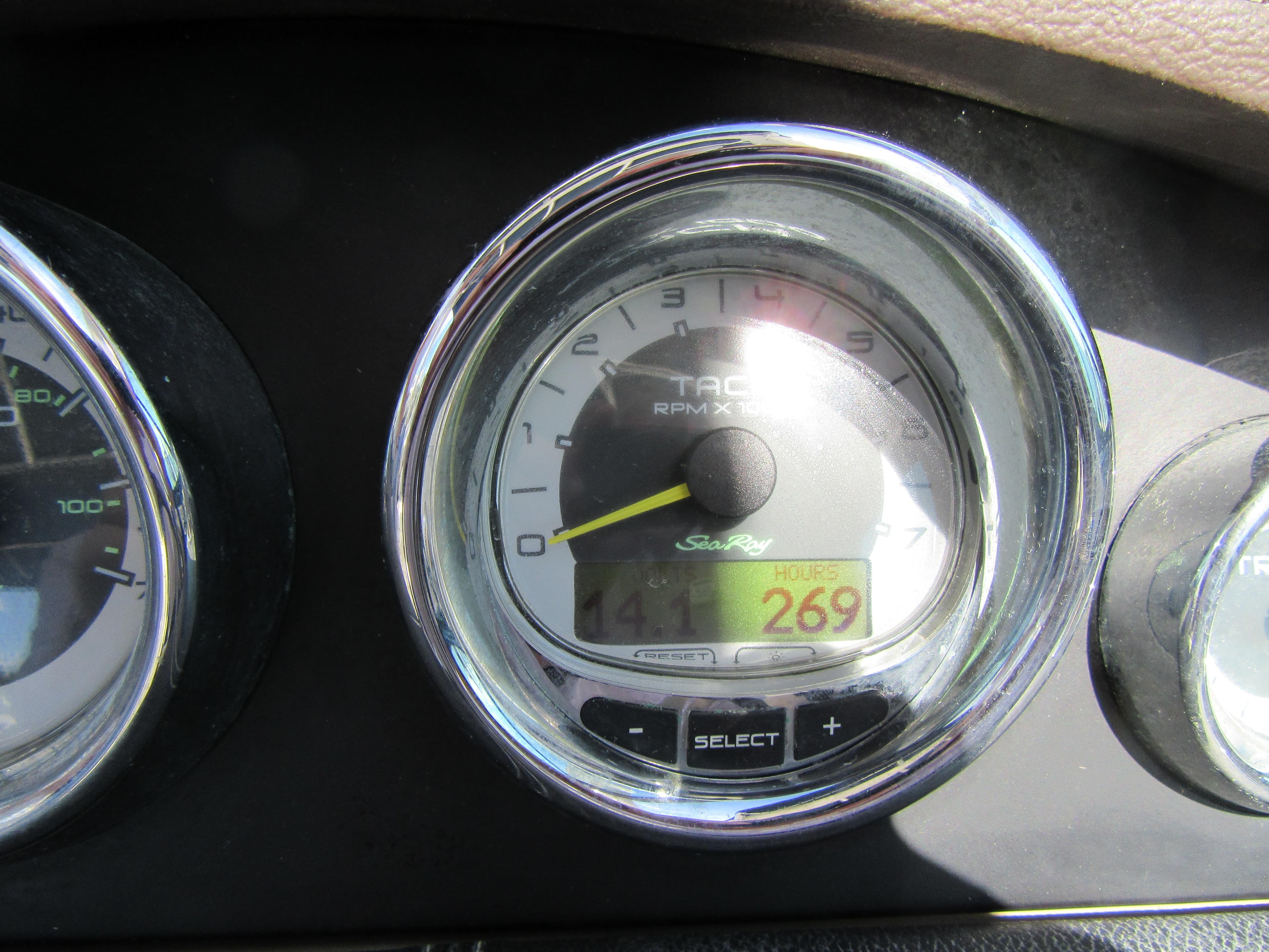 Tachometer of 2011 Sea Ray 250 SLX showing 269 hours.