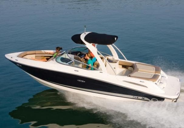 2011 Sea Ray 250 SLX boat cruising on calm water, featuring sleek design and spacious seating.