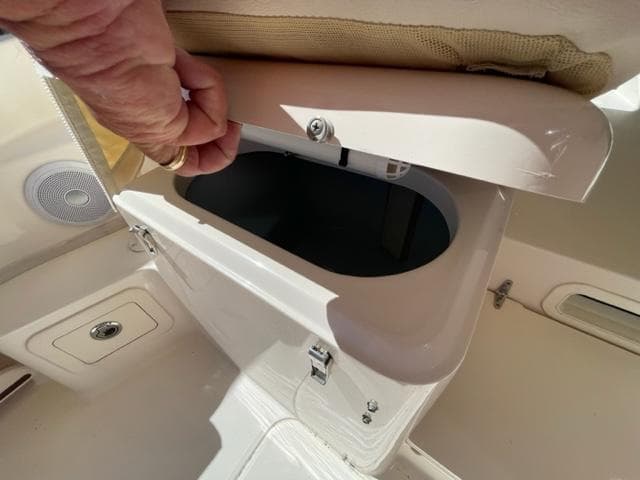 Grady-White 300 Marlin 2017 boat storage compartment being opened.