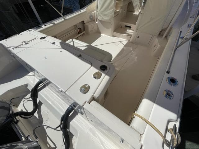 2017 Grady-White 300 Marlin boat interior with seating and storage compartments.