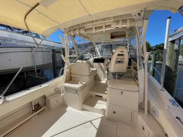 2017 Grady-White 300 Marlin boat interior with seating and helm station.