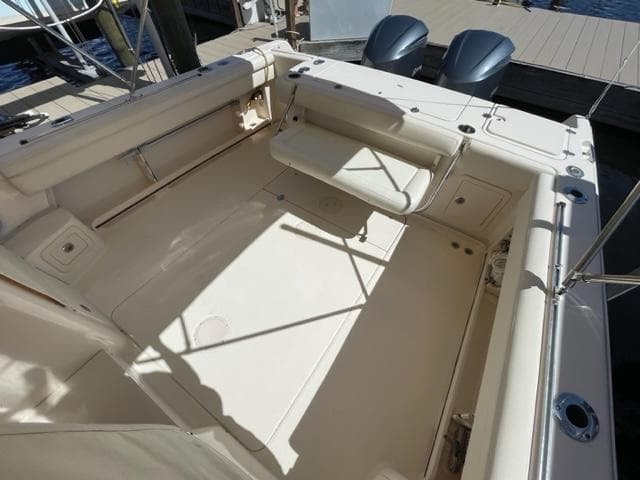 2017 Grady-White 300 Marlin boat deck with seating and storage.