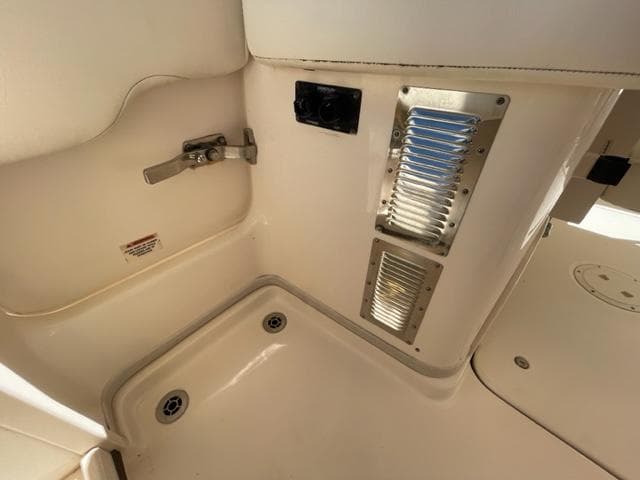 2017 Grady-White 300 Marlin boat interior detail with drainage and ventilation.
