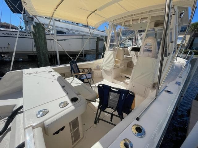 2017 Grady-White 300 Marlin boat interior with seating and canopy.