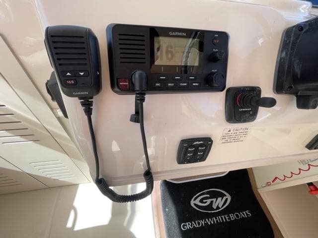 Garmin radio system on 2017 Grady-White 300 Marlin boat dashboard.