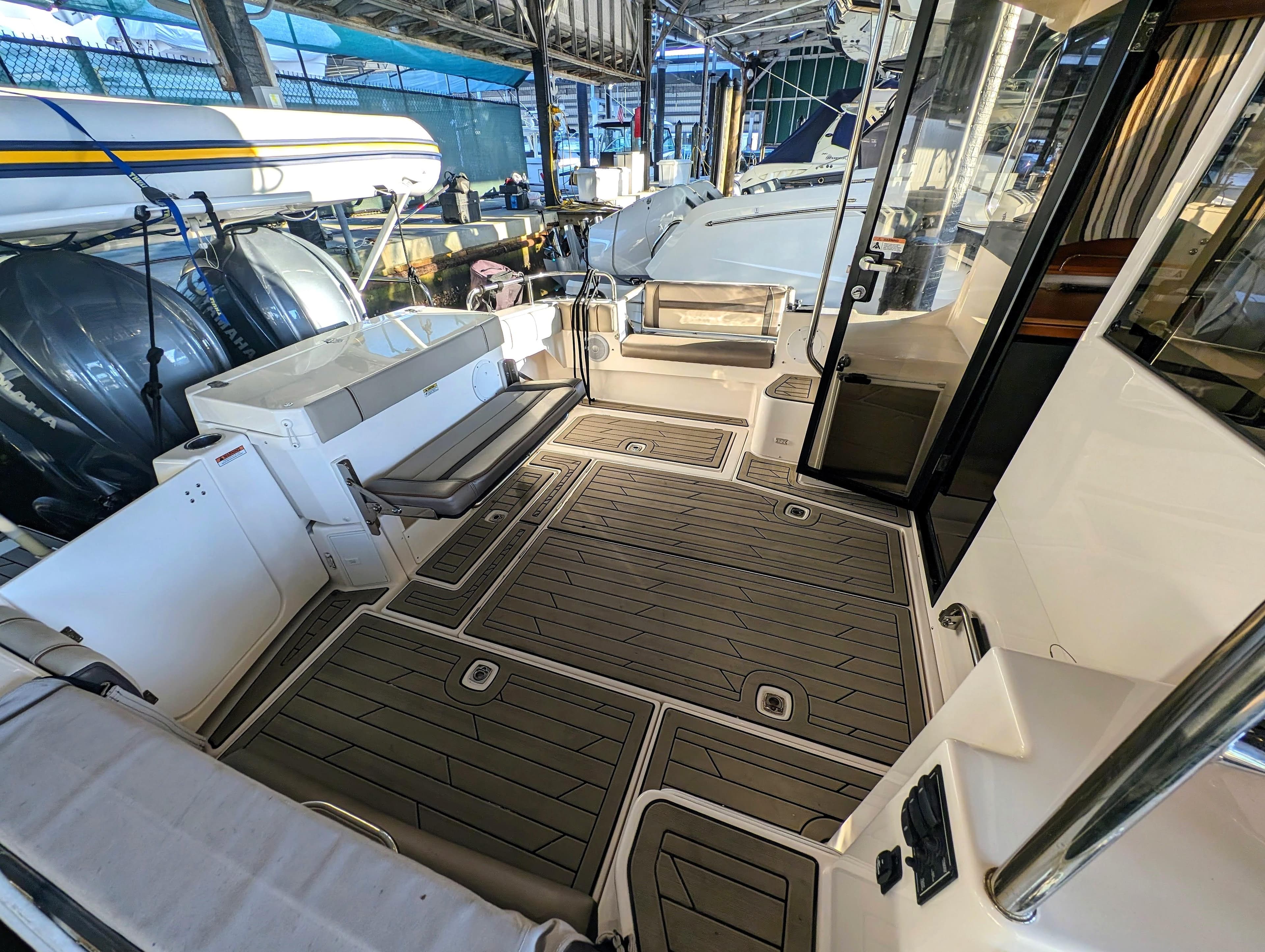 2022 Cutwater C-32 Coupe LE boat interior with spacious deck and seating.